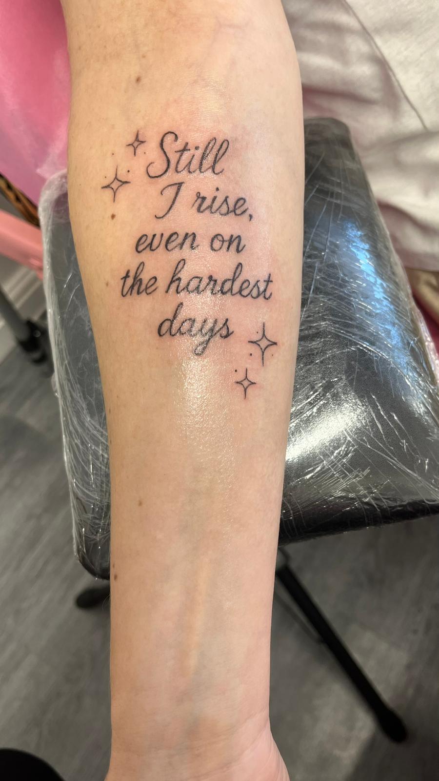 Tiny fine line symbol tattoo Ainsdale